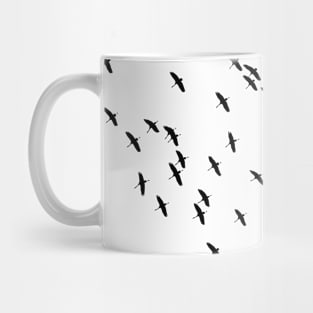 A Flock of Flying Birds in Black and White Mug